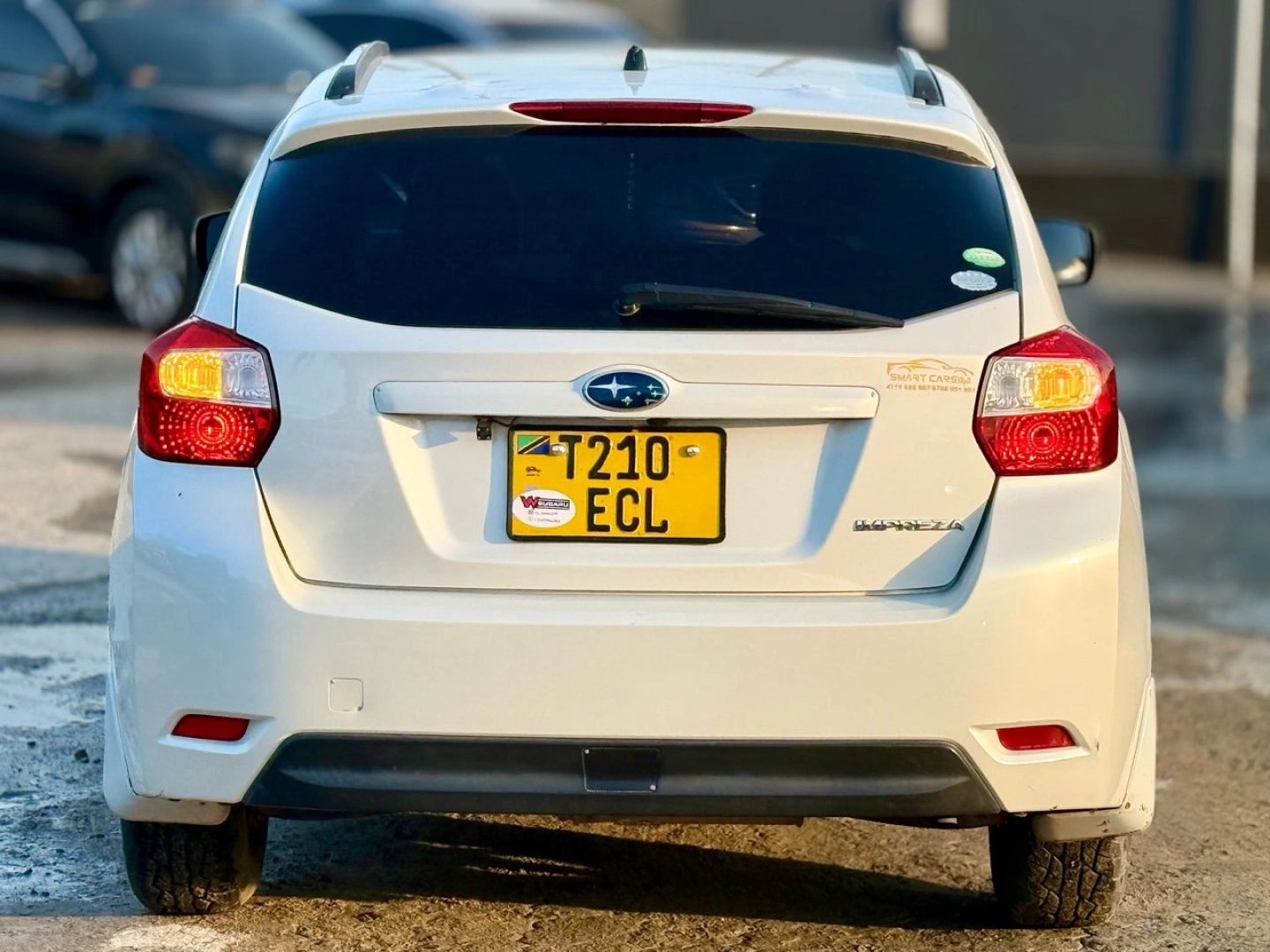 Used White Subaru Impreza Sedan 1490 CC thumbnail 4