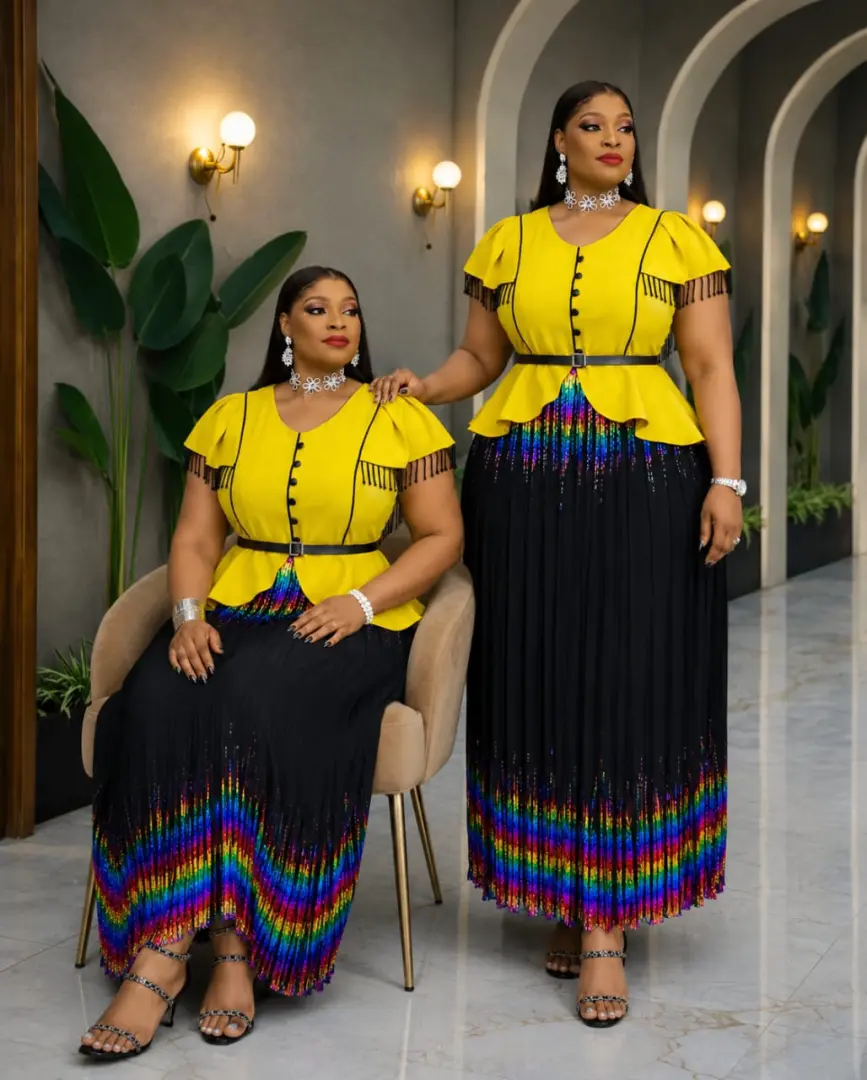 Two-Piece Peplum Top and Pleated Skirt Set