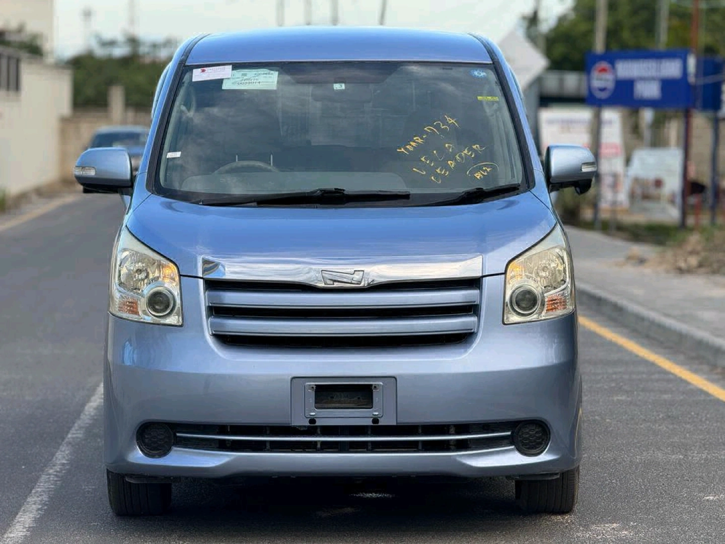 Light Blue Toyota Noah Minivan