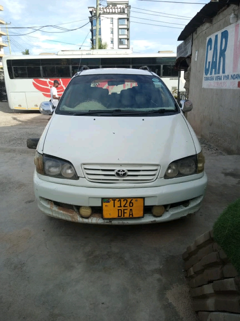 White Toyota Ipsum Minivan