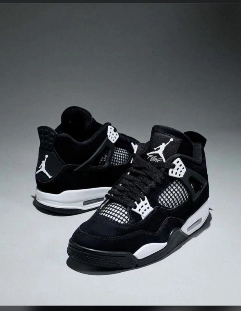 Air Jordan 4 Black and White Sneakers