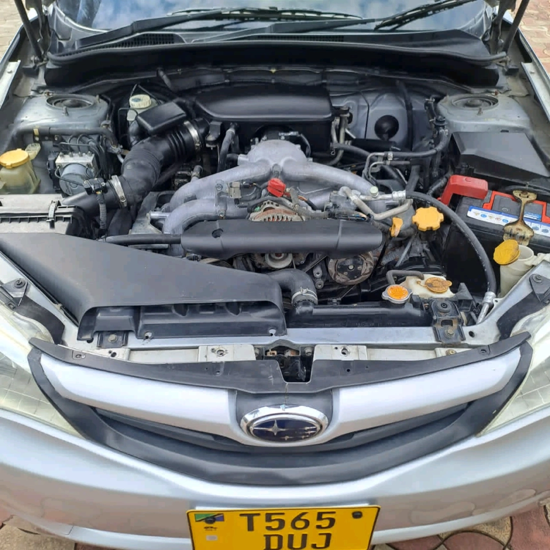 Silver Subaru Impreza Sedan thumbnail 6