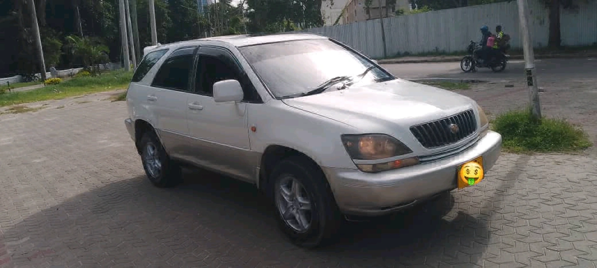 White Toyota Harrier SUV (Old Model)