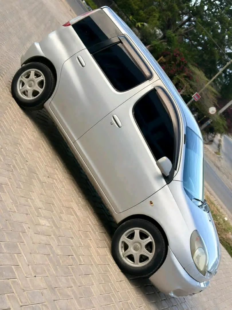 Toyota Fun Cargo Silver 7.8M TZS thumbnail 2