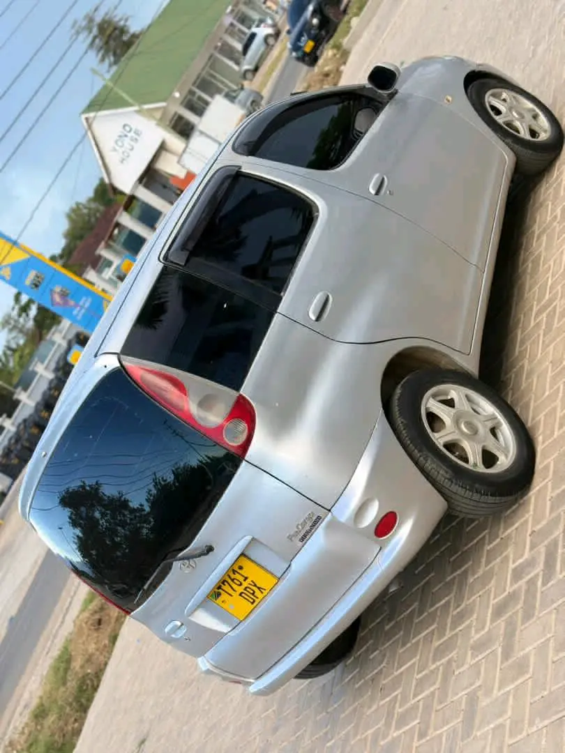 Toyota Fun Cargo Silver 7.8M TZS thumbnail 5