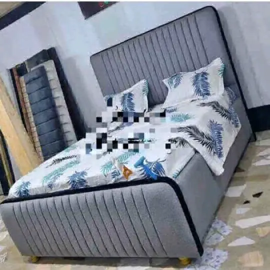 Upholstered Double Bed with Leaf Pattern Bedding
