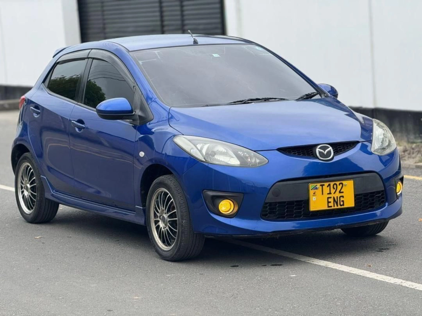 Blue Mazda Demio Hatchback with Sports Rims thumbnail 4