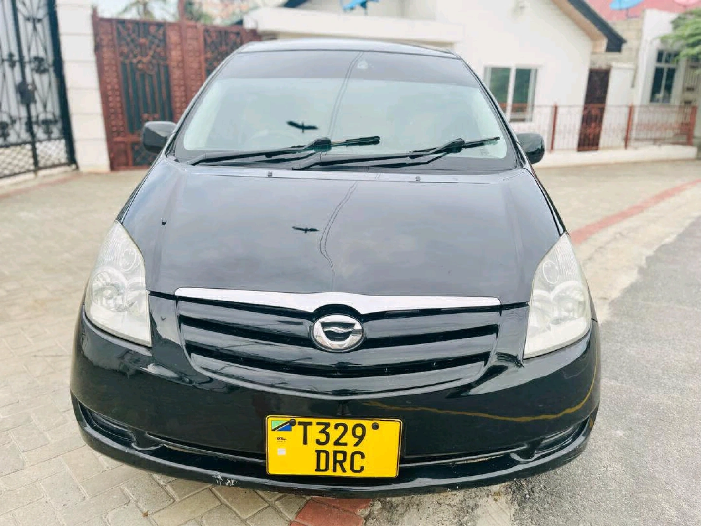 Black Toyota Corolla Spacio T329 DRC