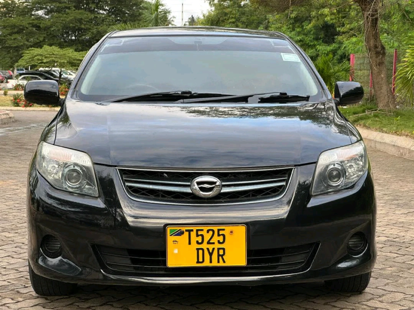 Black Toyota Fielder (Reg No. DYR)