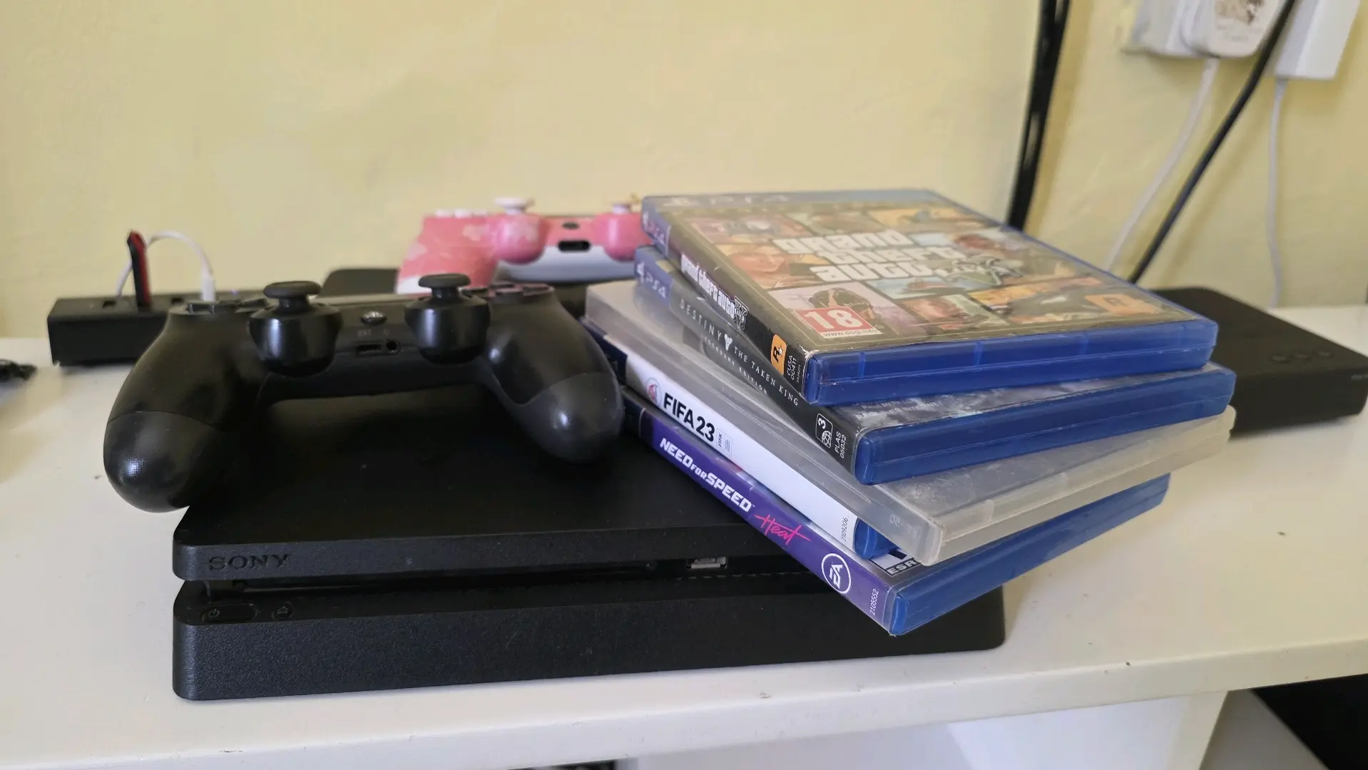PS4 Slim with 2 Controllers & 5 Games