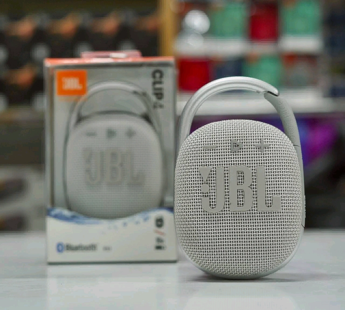 White JBL Clip 4 Portable Bluetooth Speaker