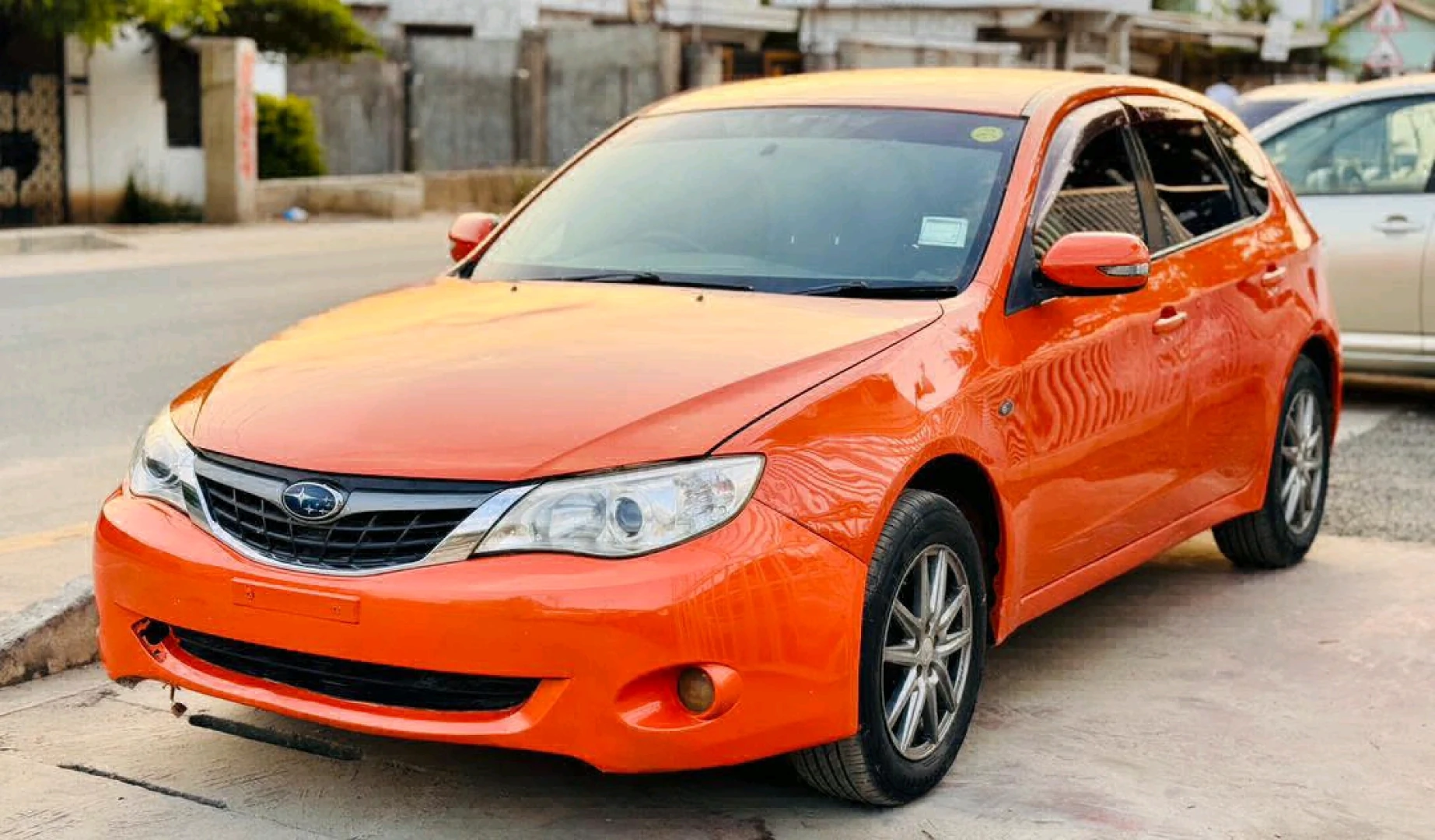 Subaru Impreza 2011 Orange Sedan thumbnail 2