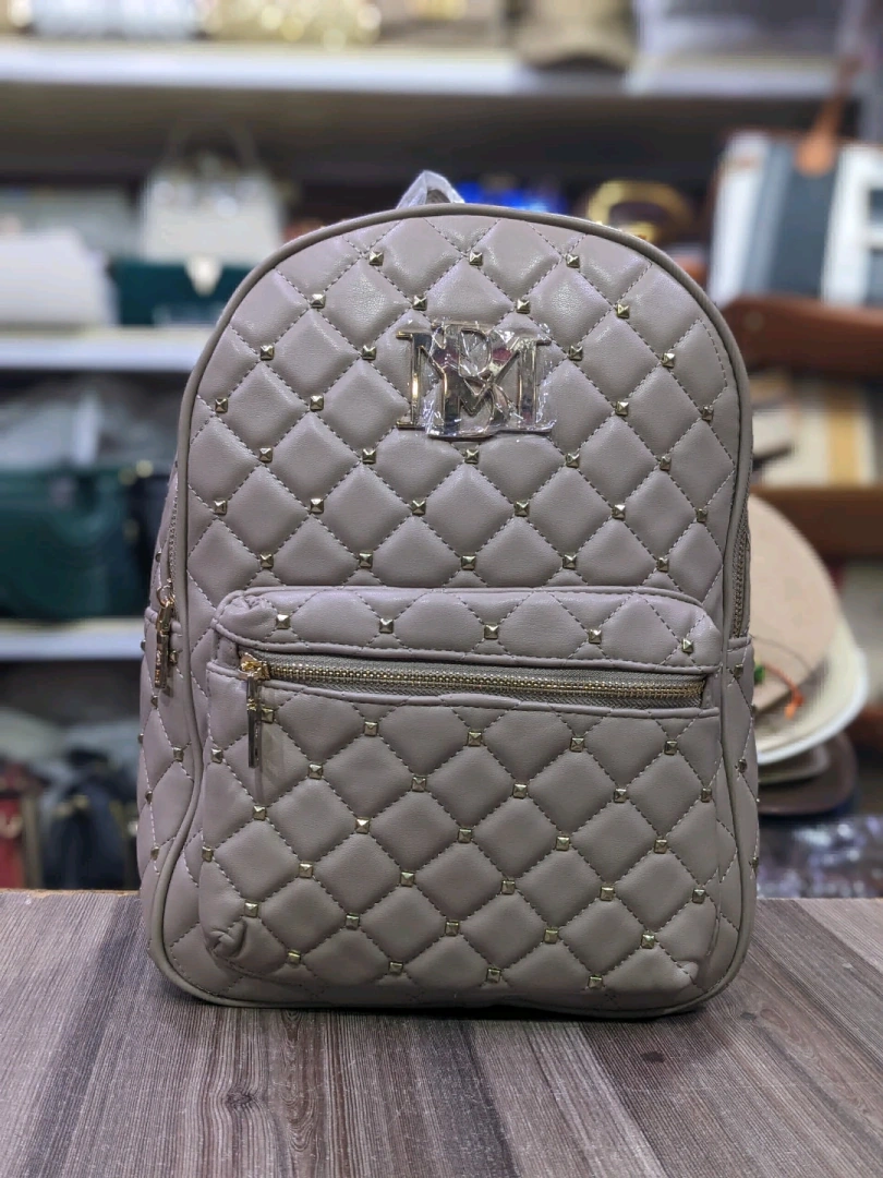 Light Brown Quilted Backpack with Gold Studs