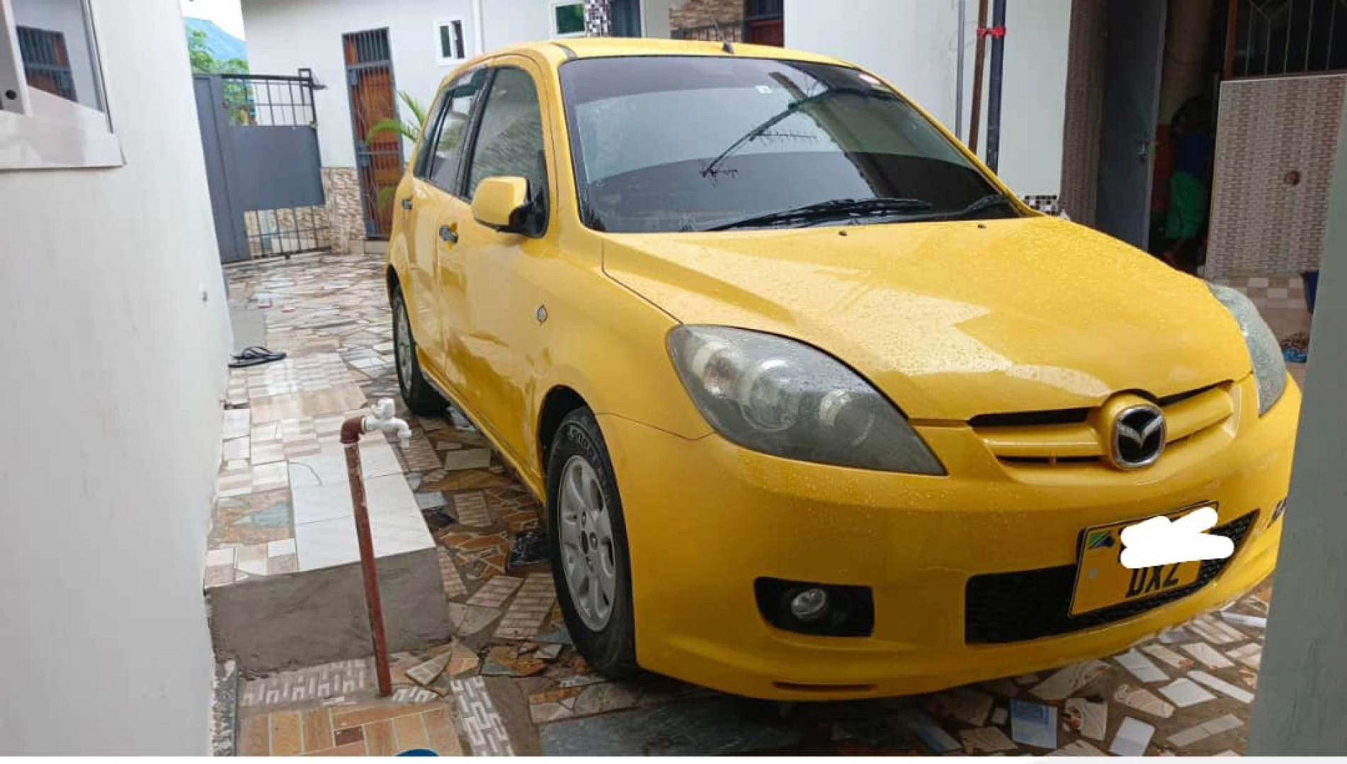 Mazda Demio DXZ Yellow Hatchback