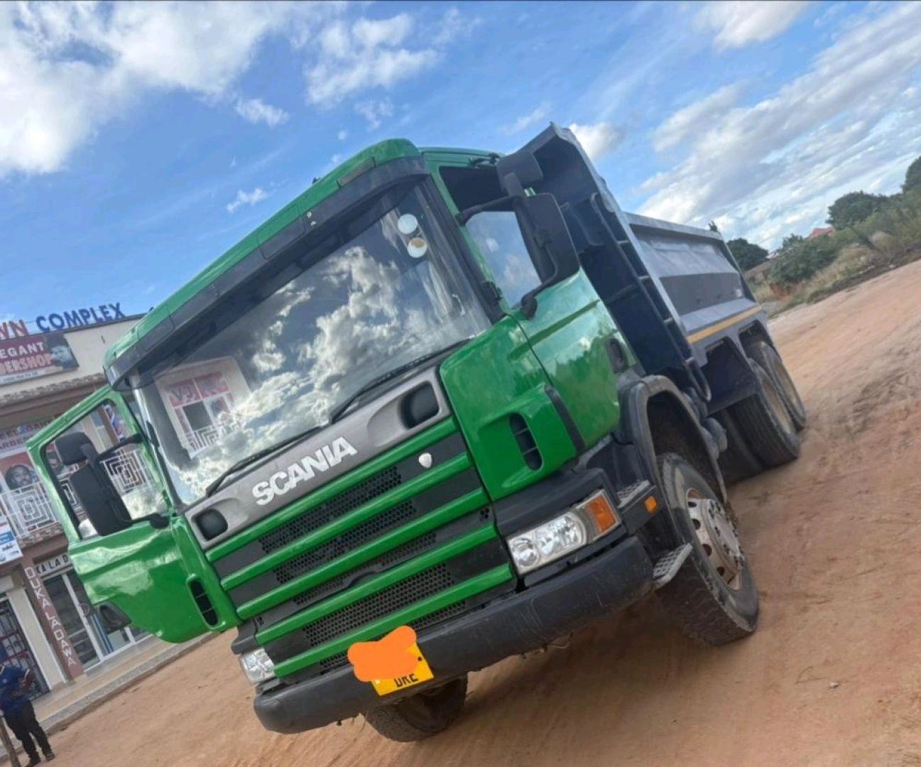 Green Scania Tipper Truck (70 Million TZS Negotiable)