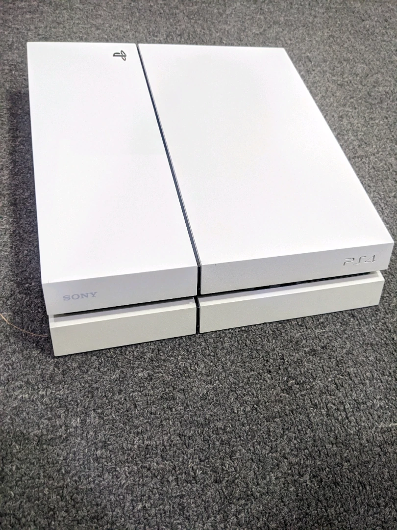 White Sony PS4 Fat Edition with 7 Games & 2 Controllers thumbnail 7