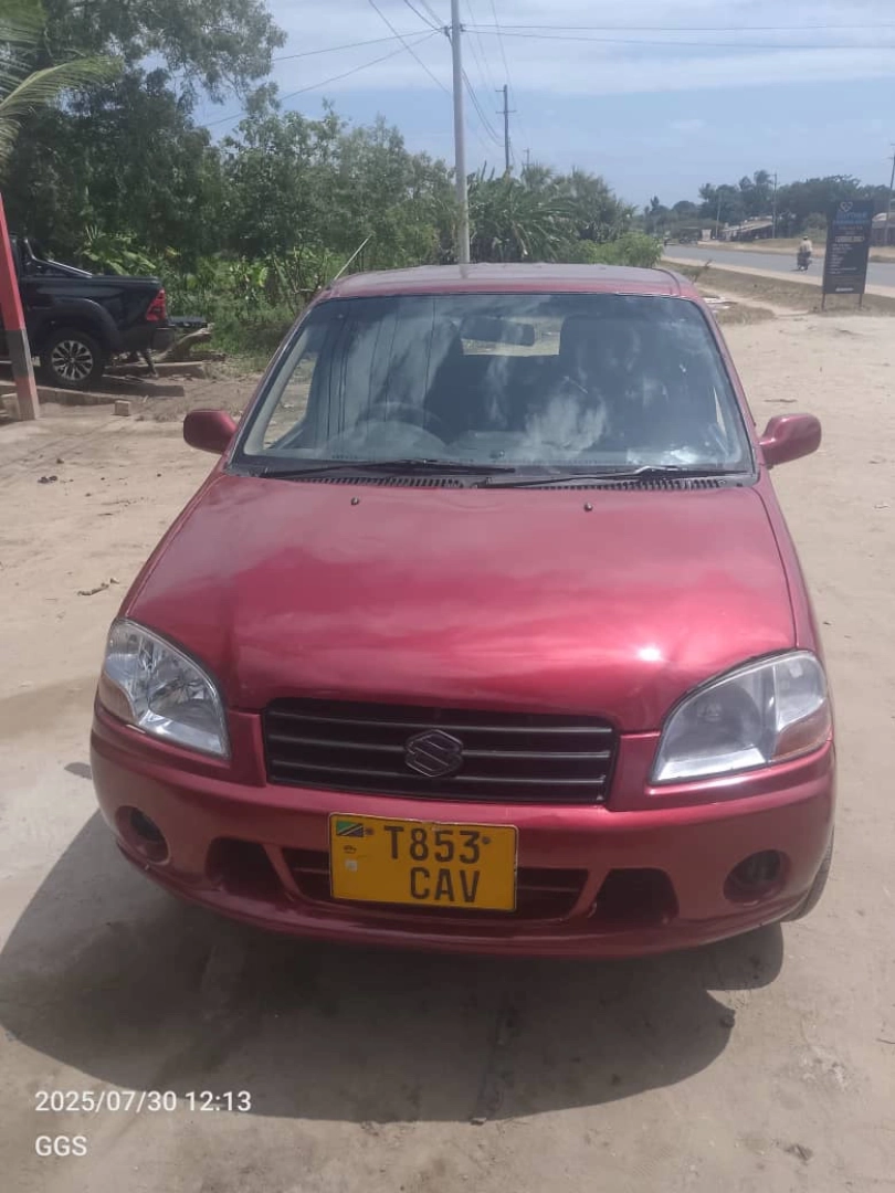 Red Suzuki Swift T853CAV for 4.5M TZS