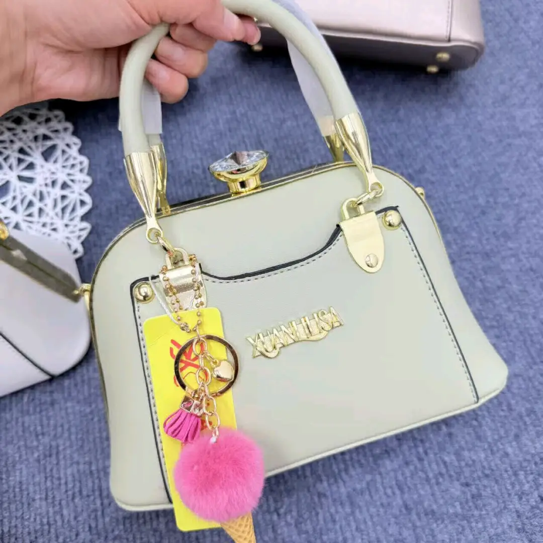 Light Green Handbag with Gold Hardware
