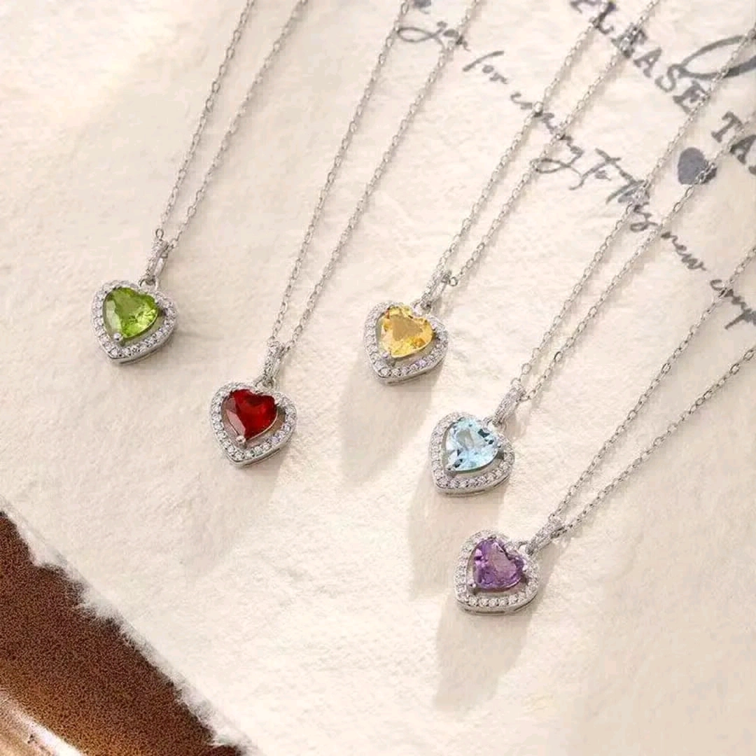 Five Silver Necklaces with Gemstone Pendants