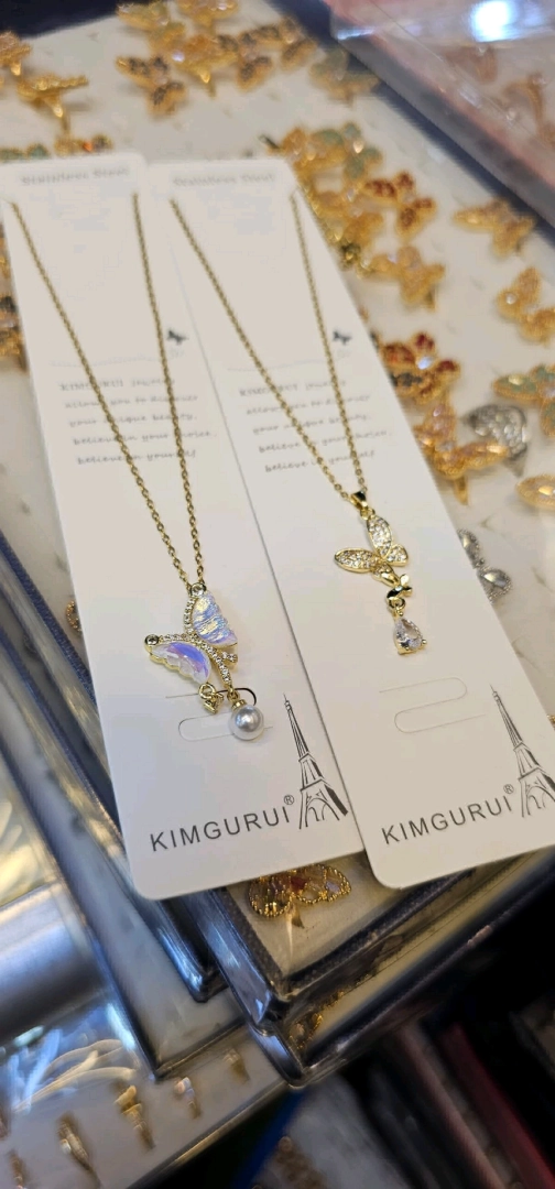 Gold-colored Necklaces with Butterfly Pendants