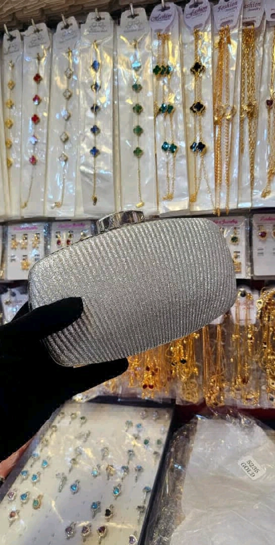 Shiny Silver Clutch Handbag